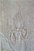 Angkor Wat temple, third enclosure, devatas sculpted in bas-relief with an extraordinary variety of intricate hair styles and costumes. 